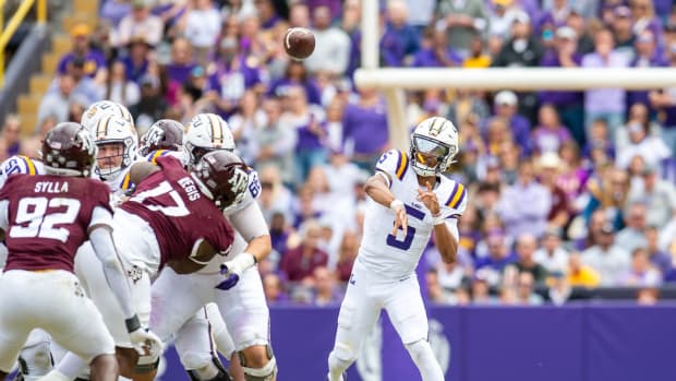 LSU Quarterback Jayden Daniels throws against Texas A&M.